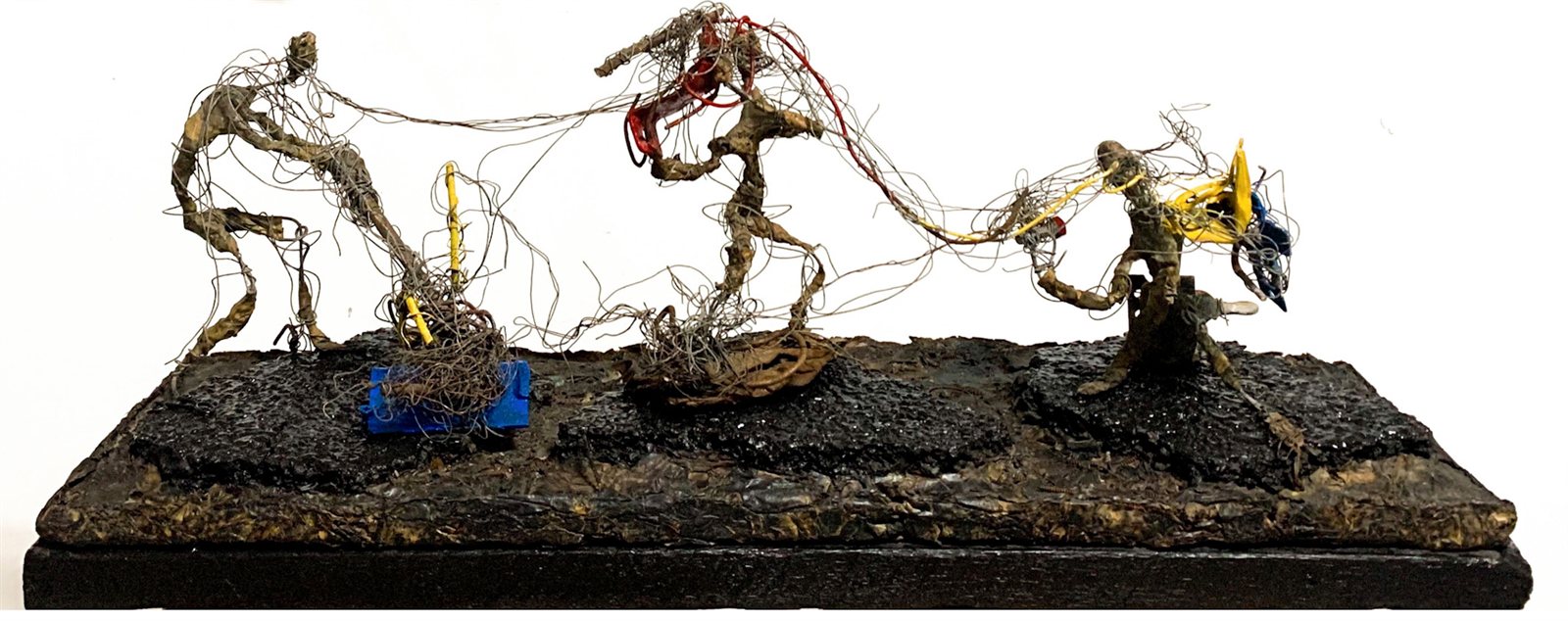 Men at Work, three wire figures on a tar and papier-mâché base